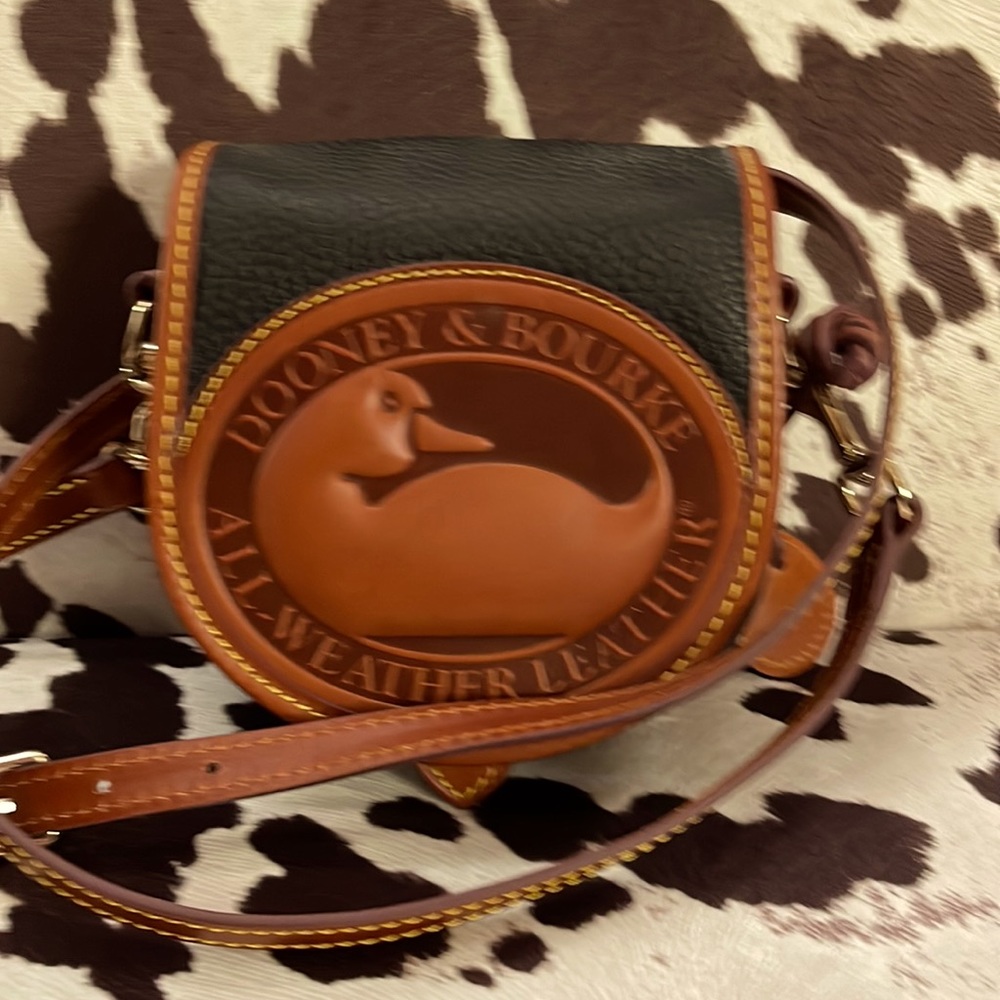 Duck Bag from Dooney & Bourke no low balling. Price is firm. I paid 228.00+l